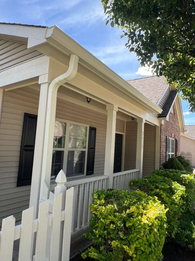 Freshly repainted porch posts, railings, soffit and fascia on a Seneca Pointe at Southern Dunes building, Indianapolis