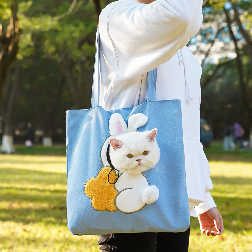 Pet shoulder bag with cartoon motif