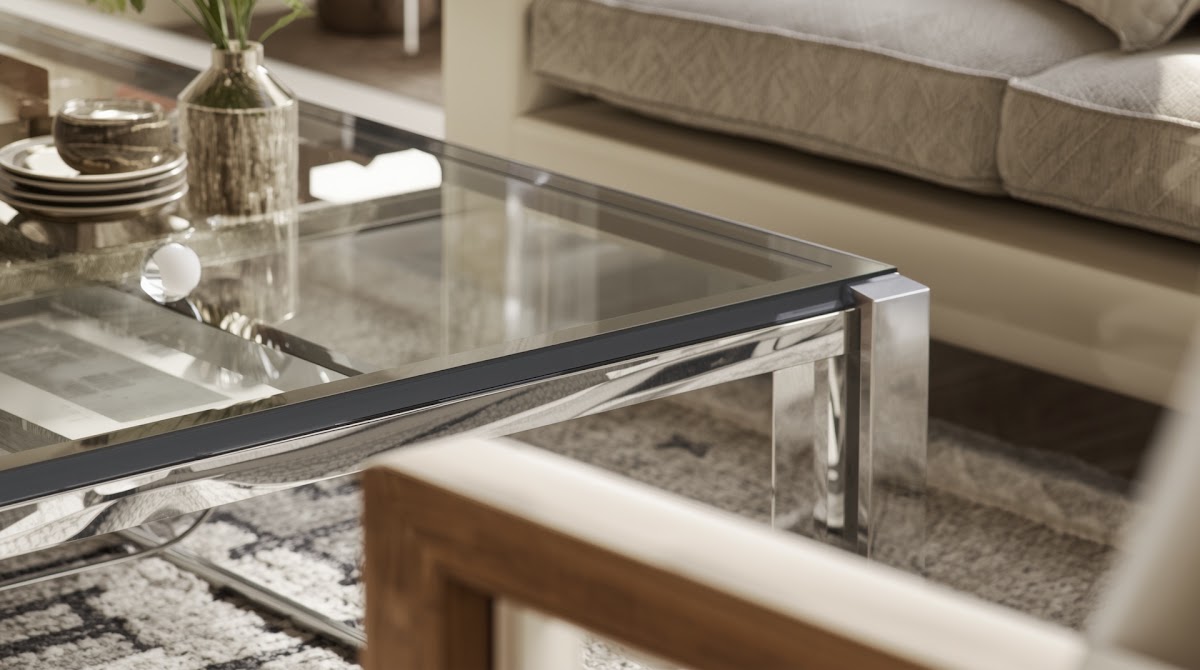 How to Style a Chrome Coffee Table Without Making Your Room Feel Cold - chrome detail beside warm wood grain and textured fabric