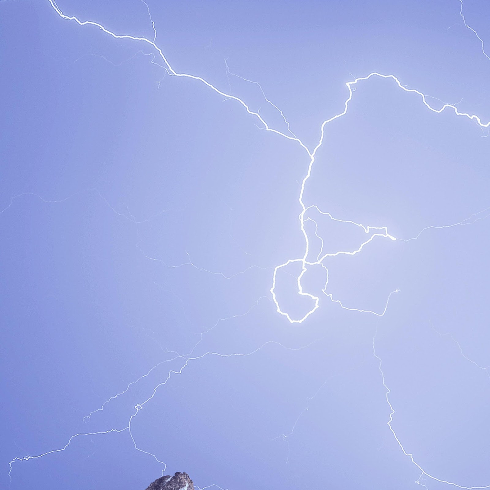 Download Dramatic Lightning Over Mountain Peaks 4K iPhone