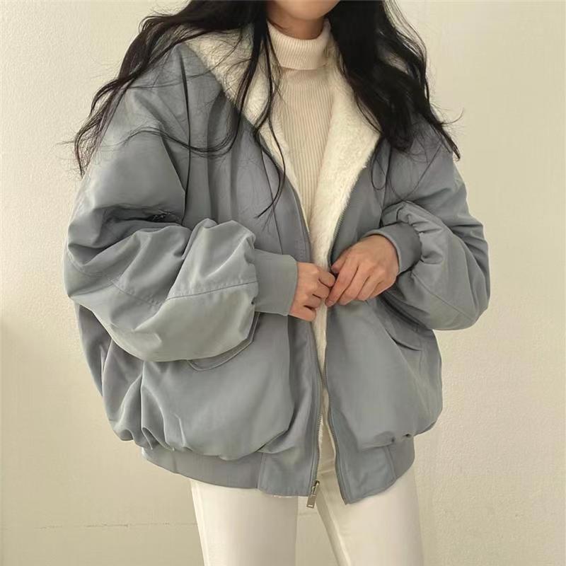 Reversible quilted jacket with lamb fleece lining