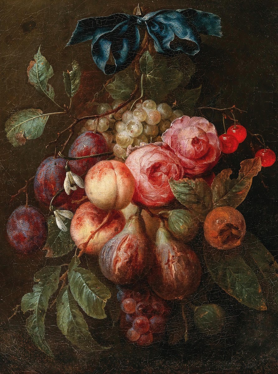 Fruit and flowers hanging from a ribbon