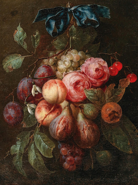 Fruit and flowers hanging from a ribbon