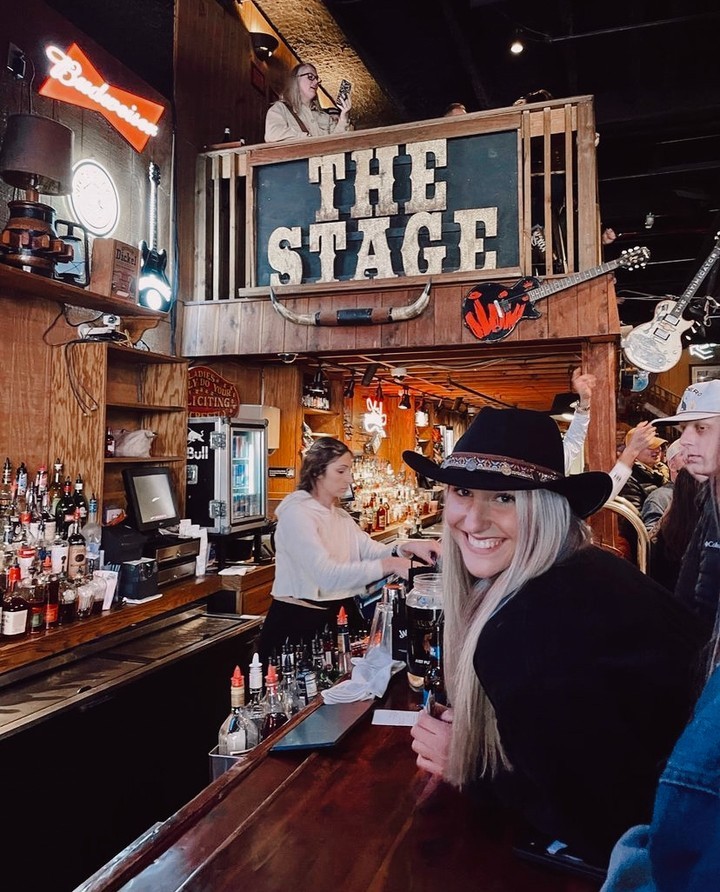 Signature cocktail and appetizer served at The Stage on Broadway.