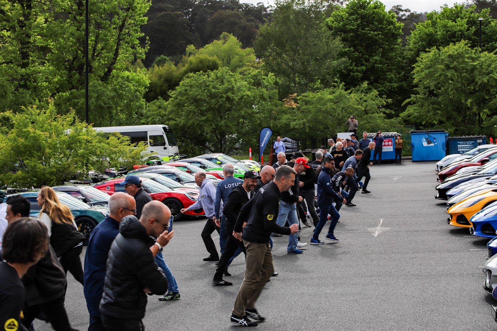 Owners dashing to their cars at Lotus Week 2024