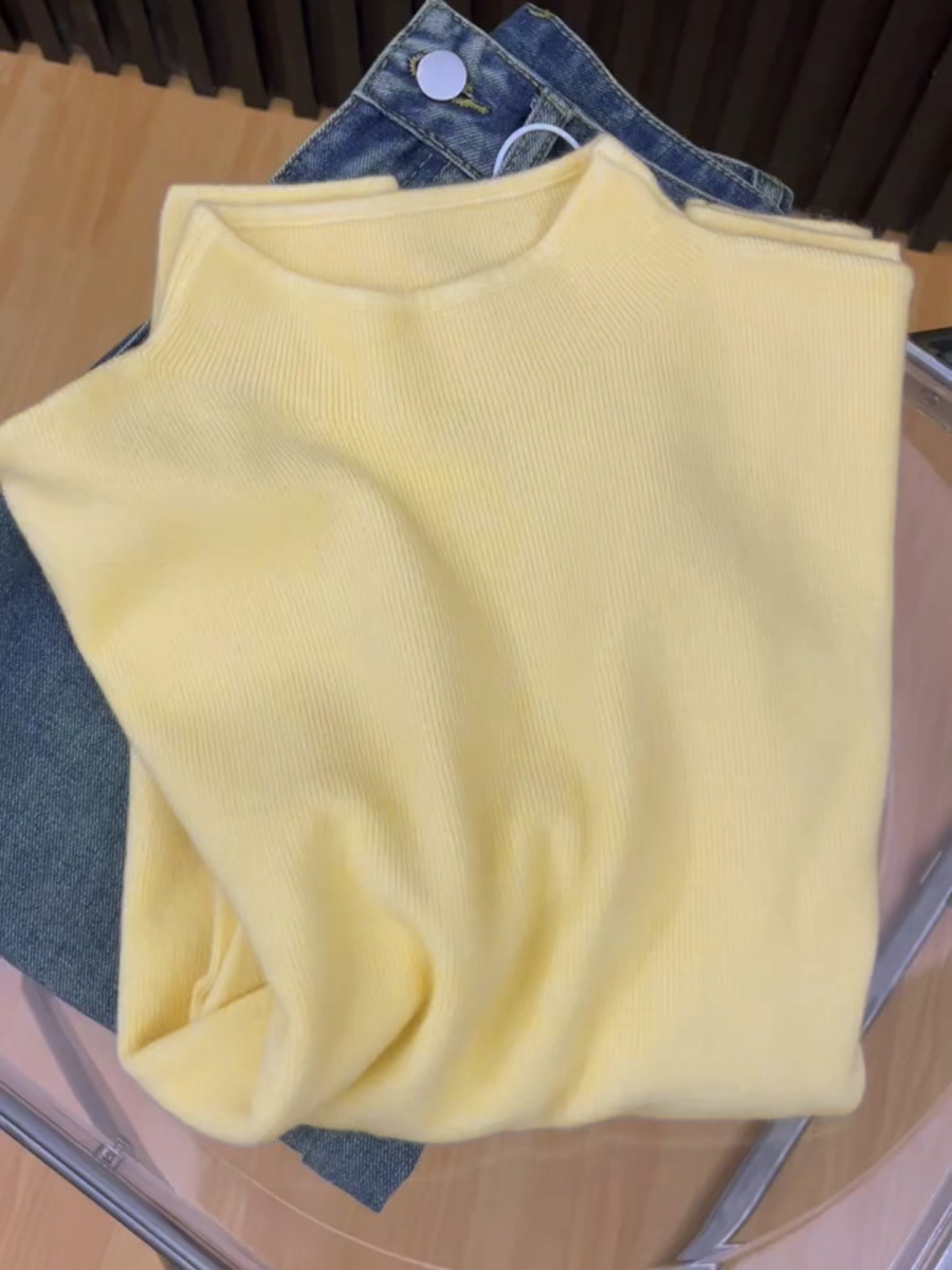 Women's knitted sweater with stand-up collar, ribbed