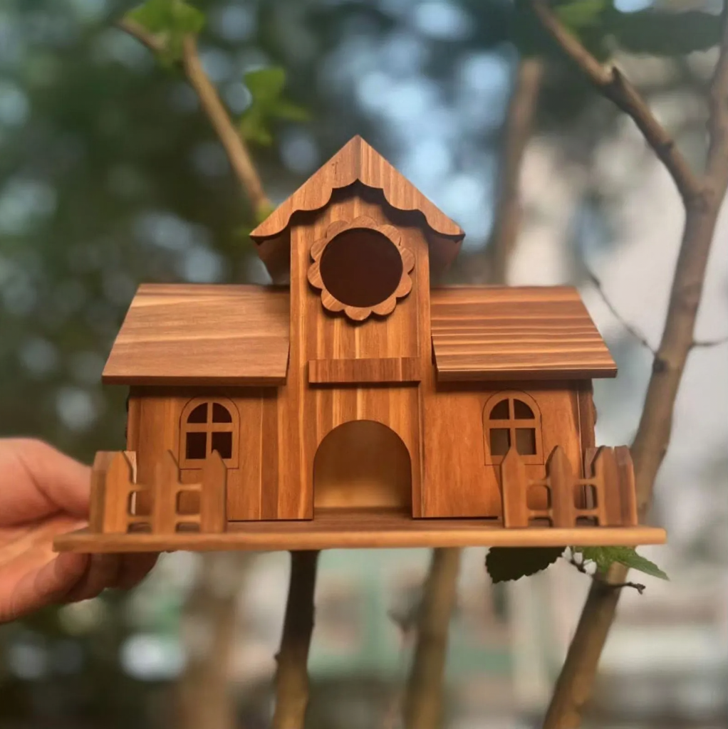 Solid wood birdhouse for the garden