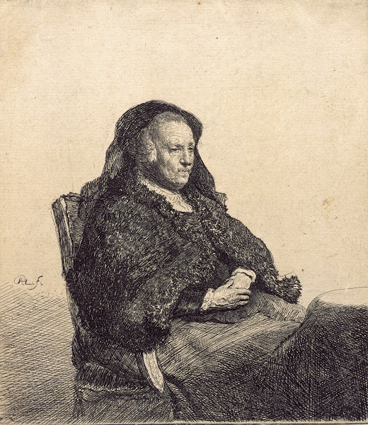 An Elderly Woman Rembrandts mother seated at a table c 1631