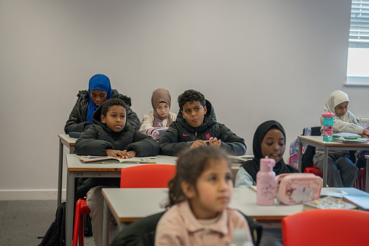 Students seated in class working together