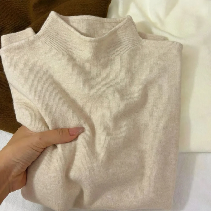 Ladies' knitted sweater with stand-up collar