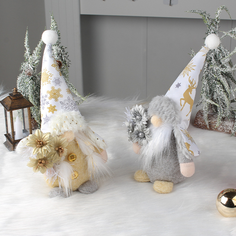 Gnome figure with hat in gold and silver appearance