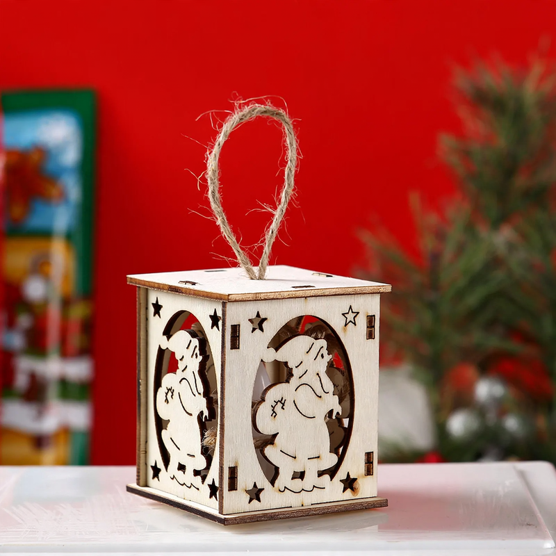 Illuminated wooden house as Christmas decoration