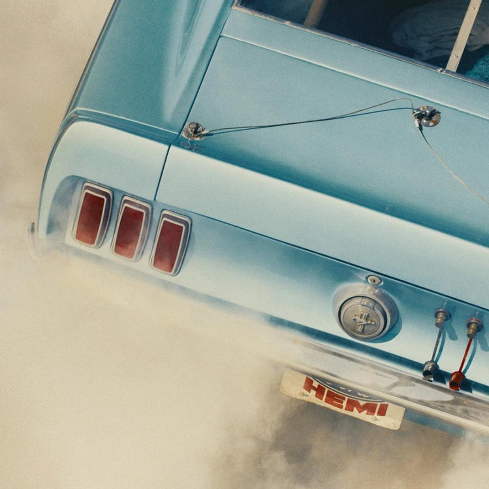 Download Teal Muscle Car Kicking Up Dust Full HD iPhone