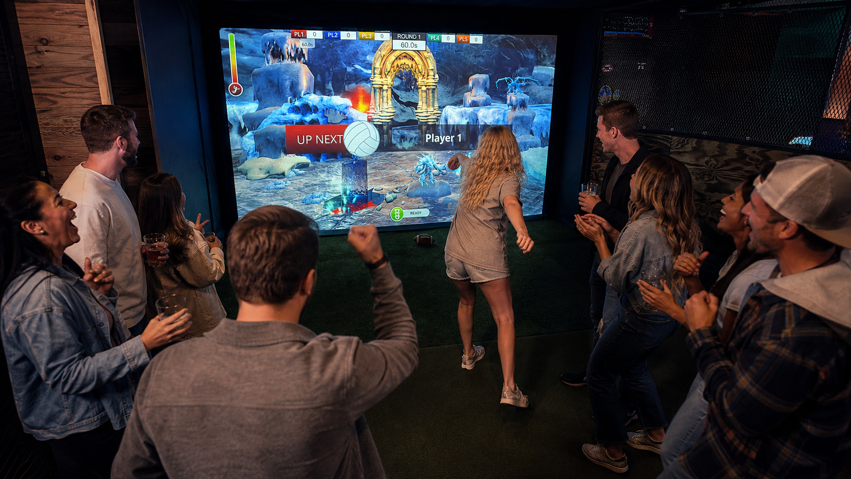 A packed group cheering during a game inside the Lake Escape Bay