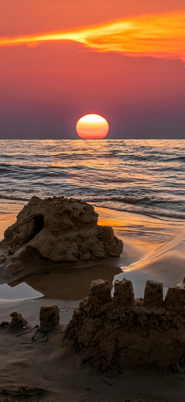 Sandcastles Under A Vibrant Sunset - Nature Photography 2K iPhone Wallpaper (1890x4094)