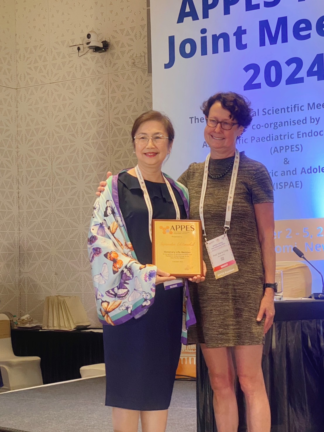 May be an image of 2 people and text