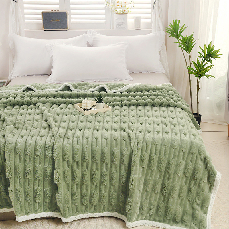 Warm plush blanket with faux fur appearance