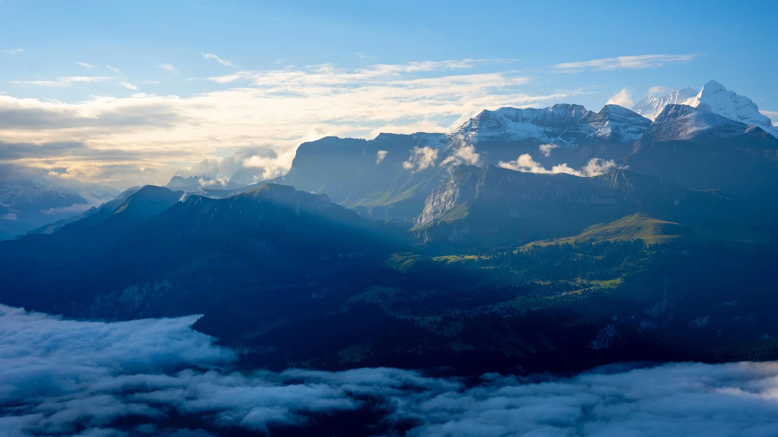 Majestic Mountain Peaks Above Clouds - Landscape Photography 5K Wallpaper (6000x3372)
