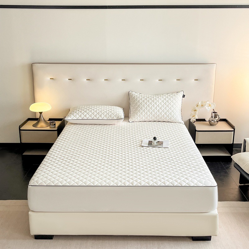 Quilted fitted cover with slip protection