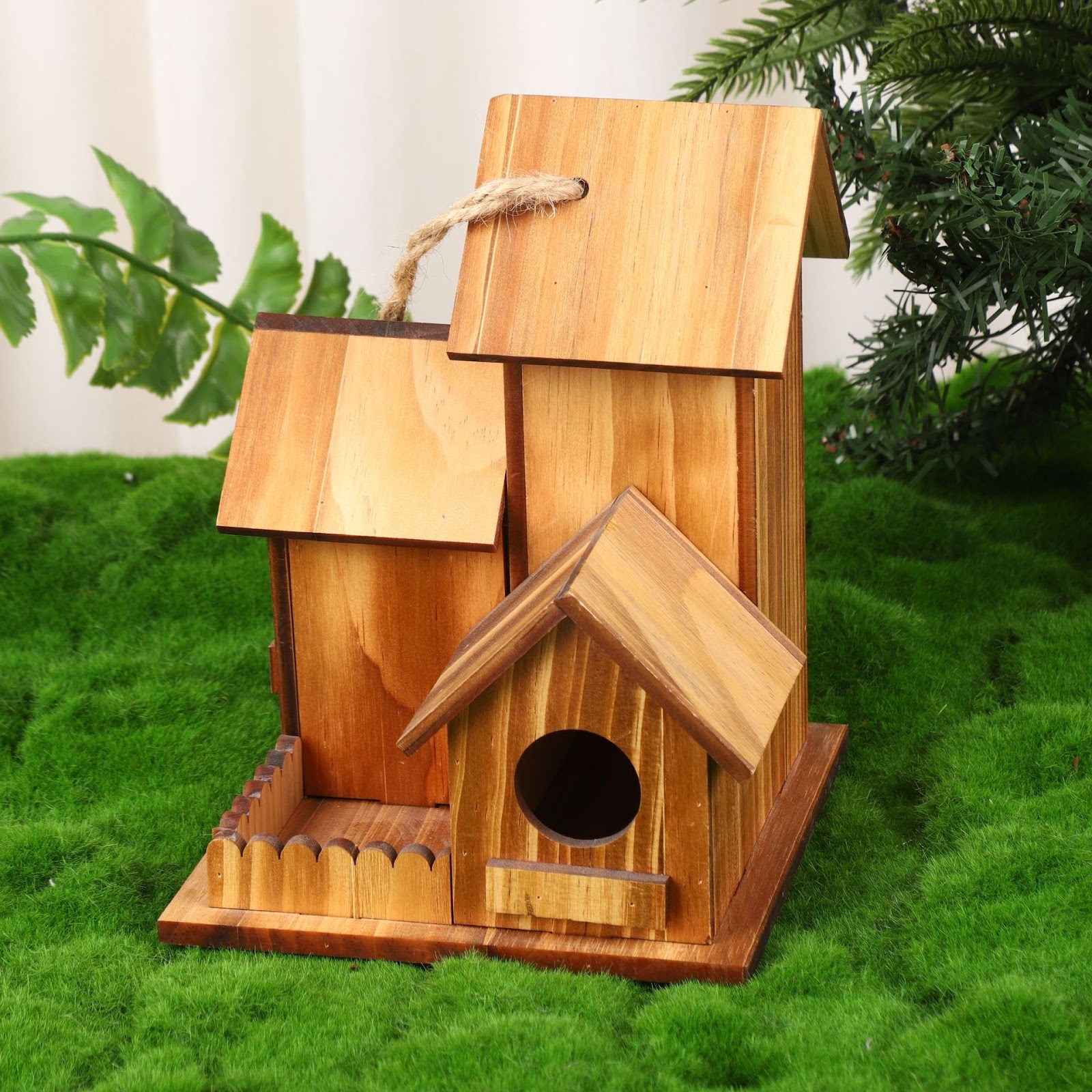 Hanging birdhouse made of pine wood