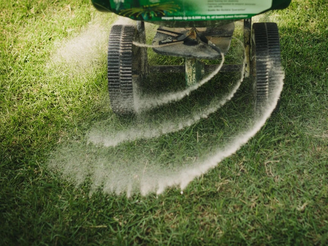 Treating and fertilizing lawn