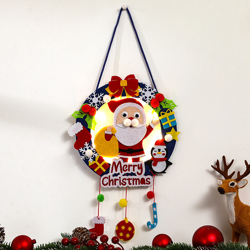 Christmas wreath made of fabric with LED lighting