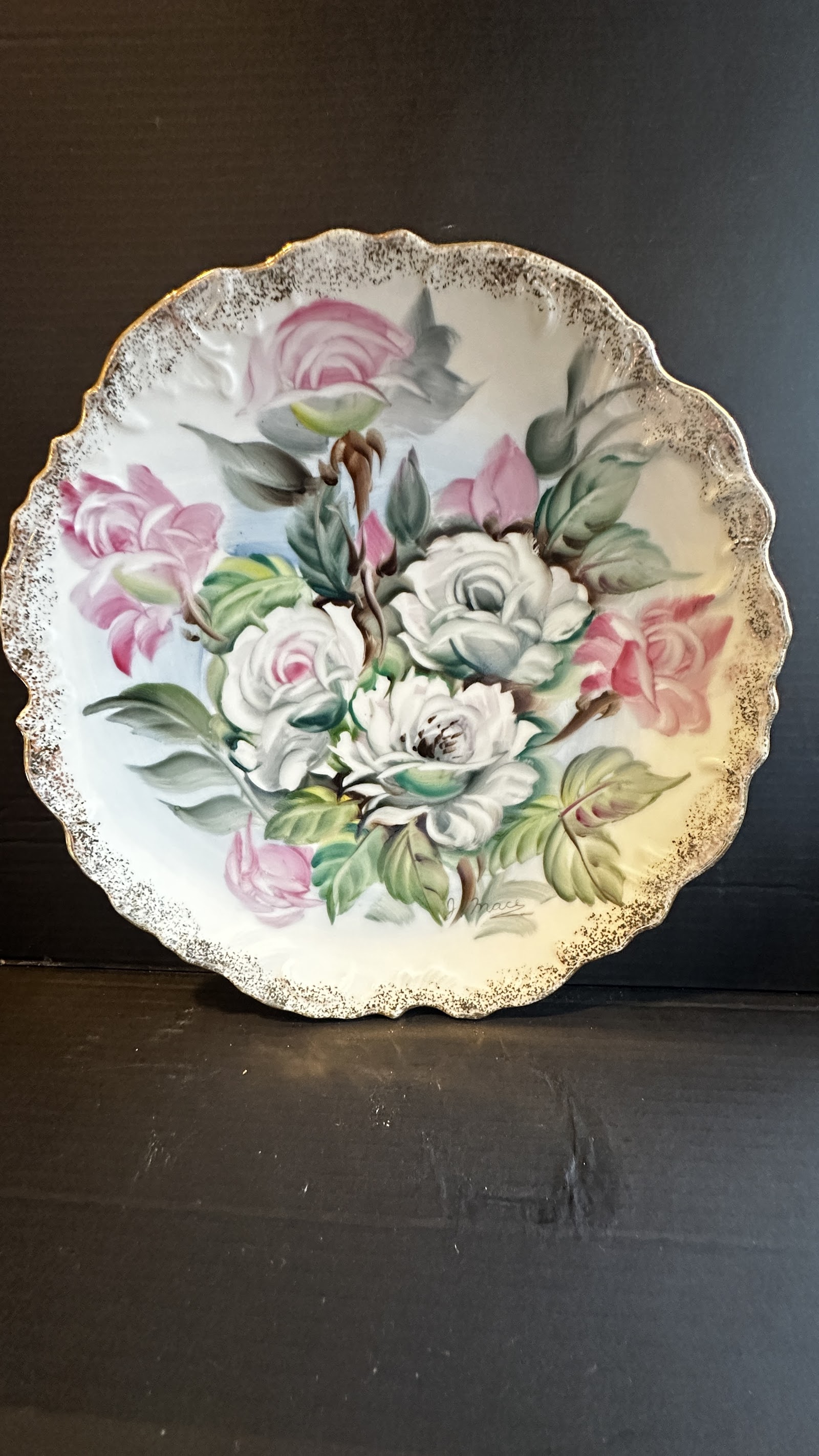 Hand-painted porcelain cabinet plate with pink and white rose floral motif, scalloped gold gilt Rococo rim, signed J. Mace, circa 1950s