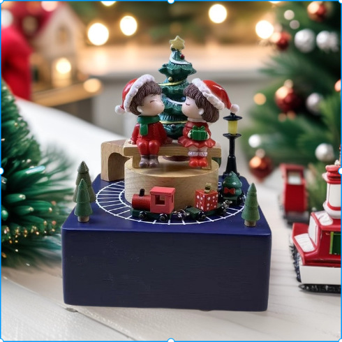 Christmas music box made of wood with winding mechanism