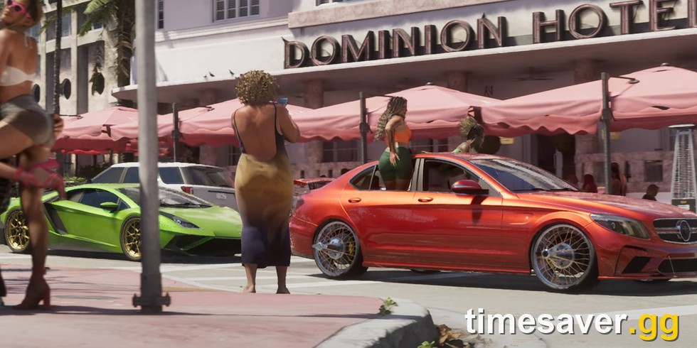 GTA 6 trailer street scene showing multiple vehicles in front of the Dominion Hotel in Vice City