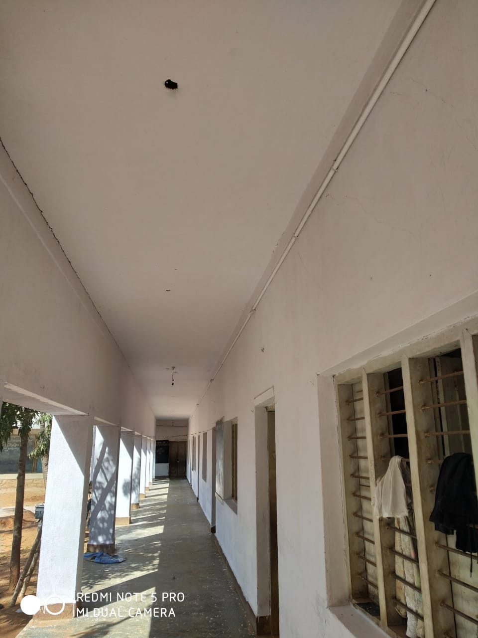 New desks and learning resources inside a restored classroom