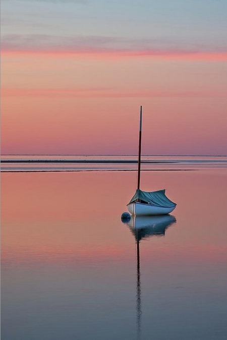 peaceful sunset sailboat