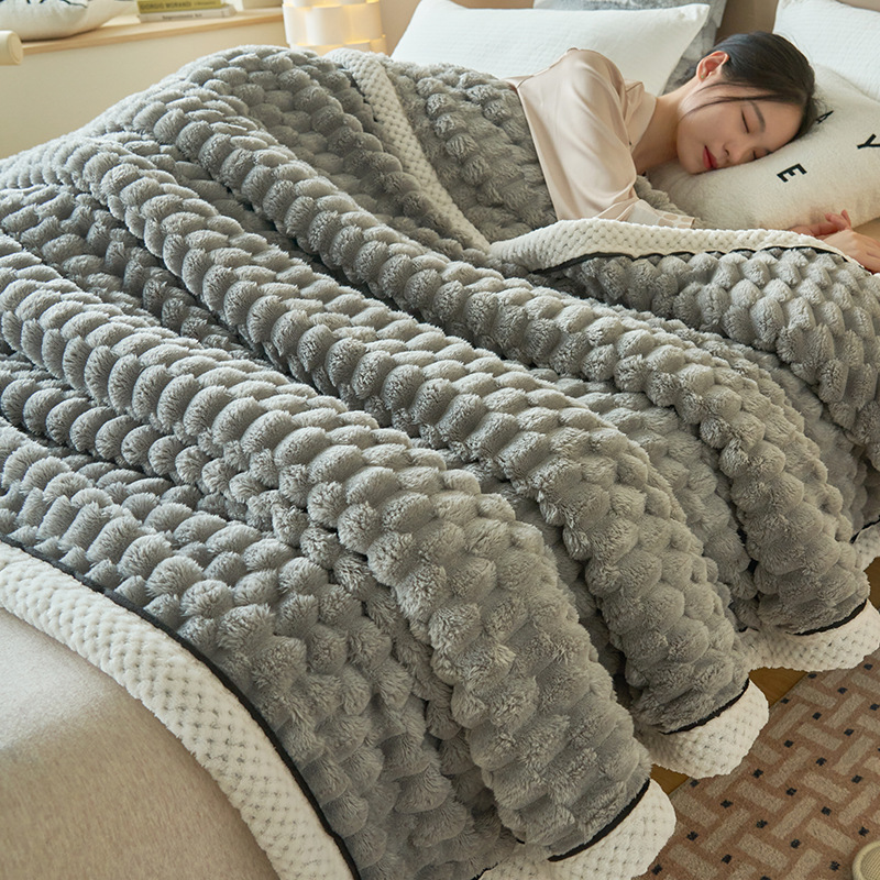 Soft coral fleece blanket with lamb fleece appearance
