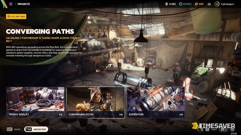 ARC Raiders Projects menu showing the Converging Paths board — the season's three project tracks (Trophy Display, Converging Paths 1/6, Expedition) inside a cluttered hideout, where Raiders gather supplies, recover relics and secure safe passage for the Nomadic Envoys across the Rust Belt