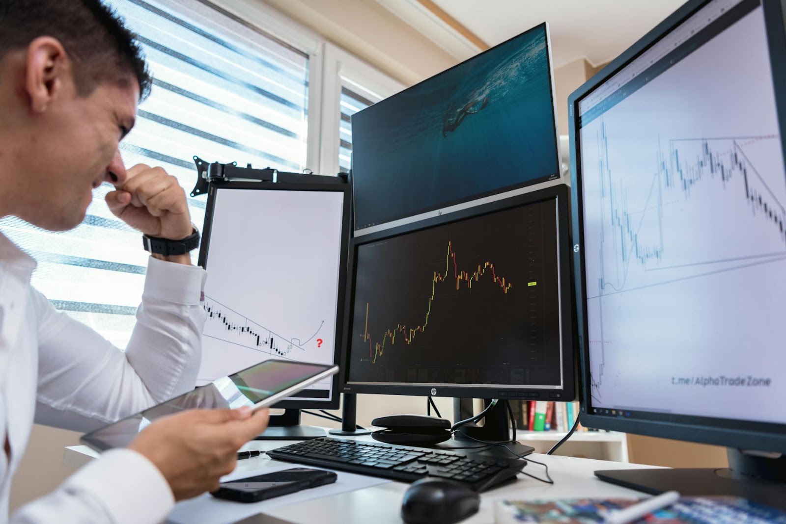A focused investor examining long-term Solana market update and investment projections on a holographic screen.