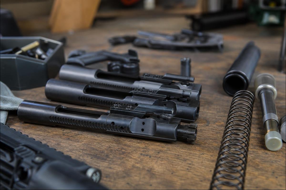 AR-15 bolt carrier weight and cycling system components