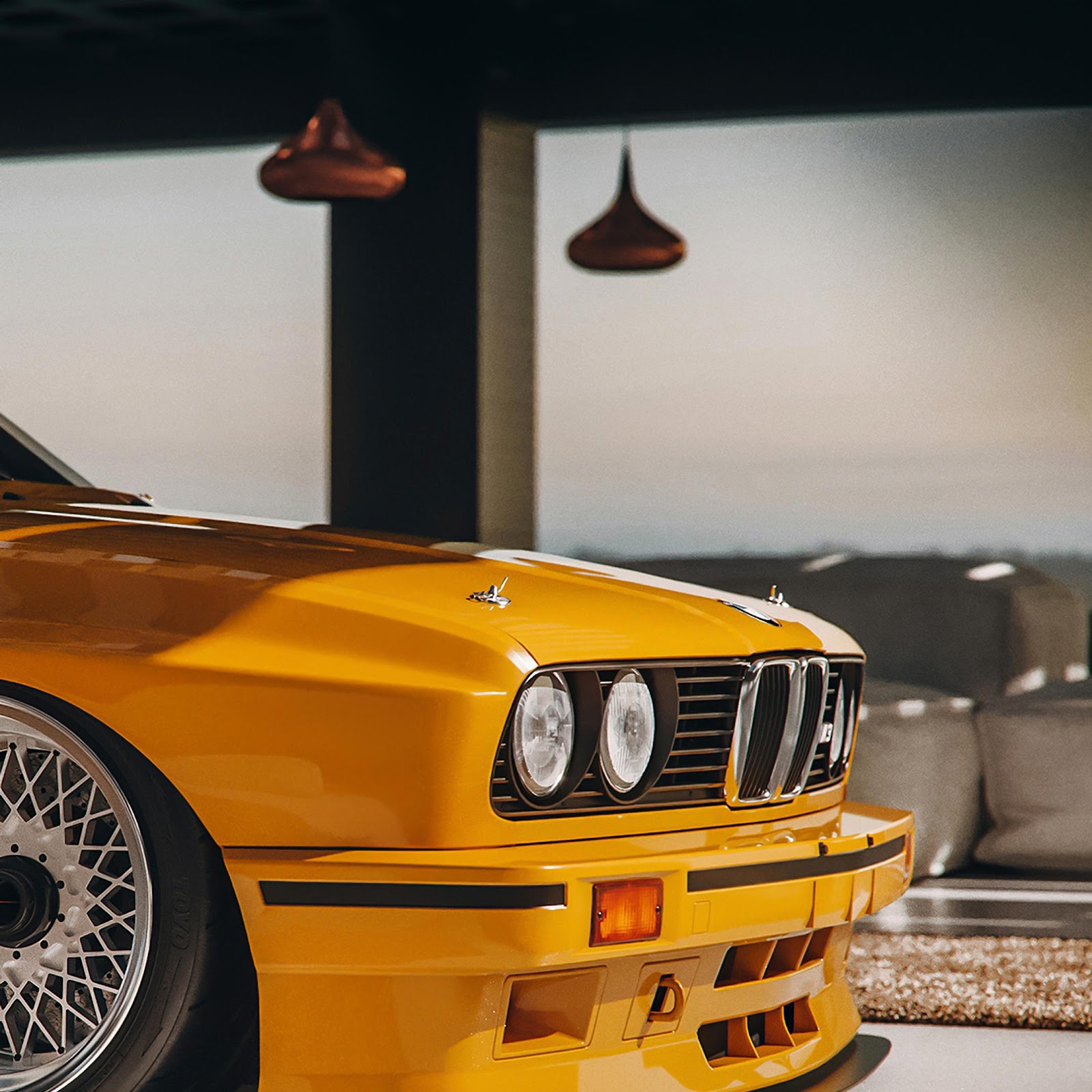 Download Yellow BMW E30 M3 Showroom 4K iPhone