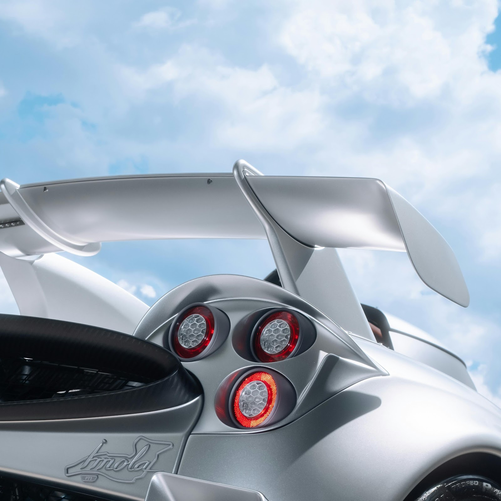 Download Silver Pagani Huayra Under Blue Sky 5K iPhone