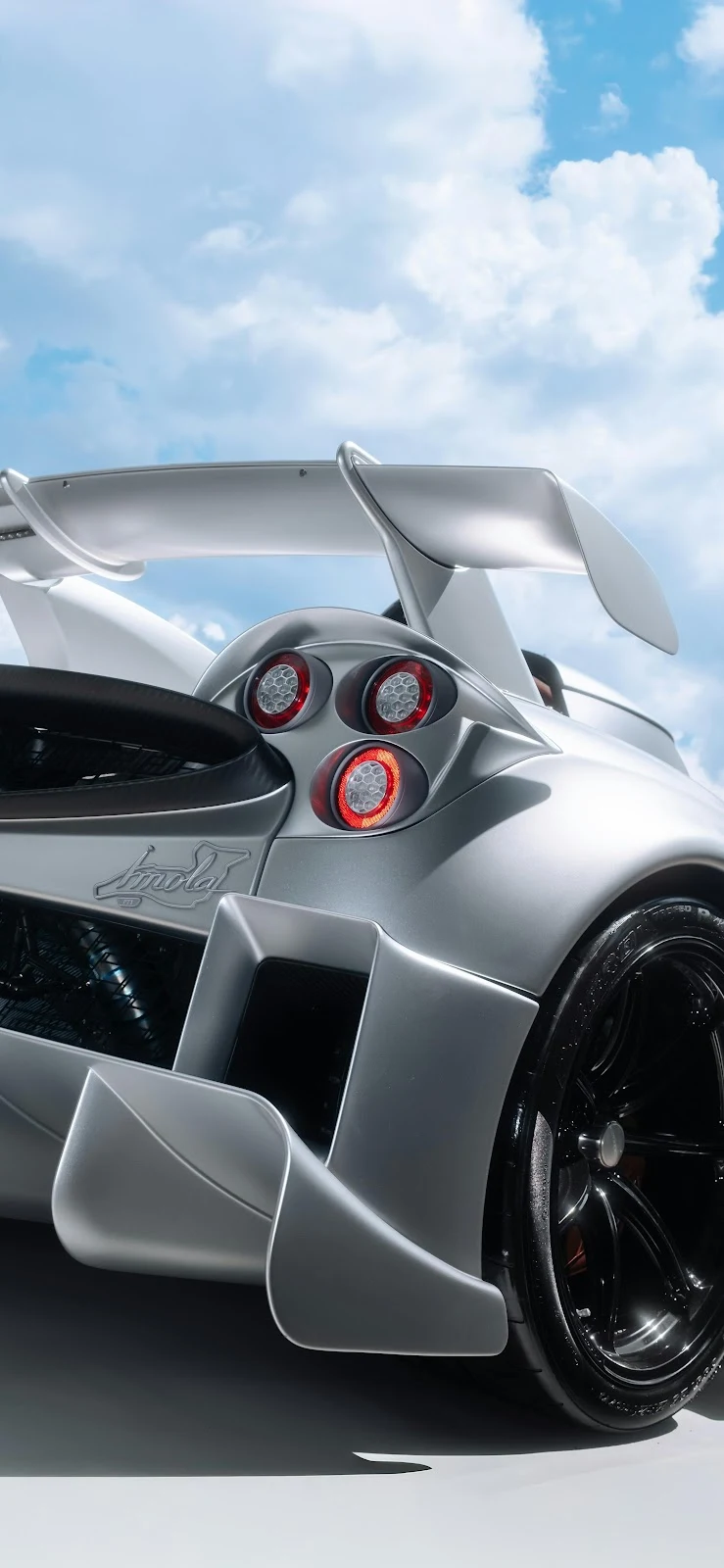 Silver Pagani Huayra Under Blue Sky - Automotive Photography 5K iPhone Wallpaper (3413x7394)