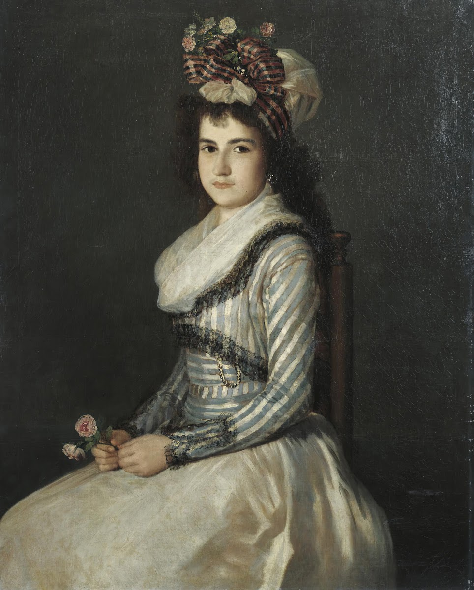 Portrait Of A Young Woman Holding Two Roses