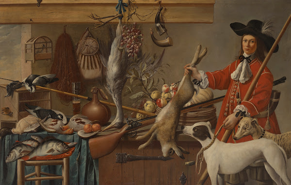 A huntsman holding a dead hare with his two dogs
