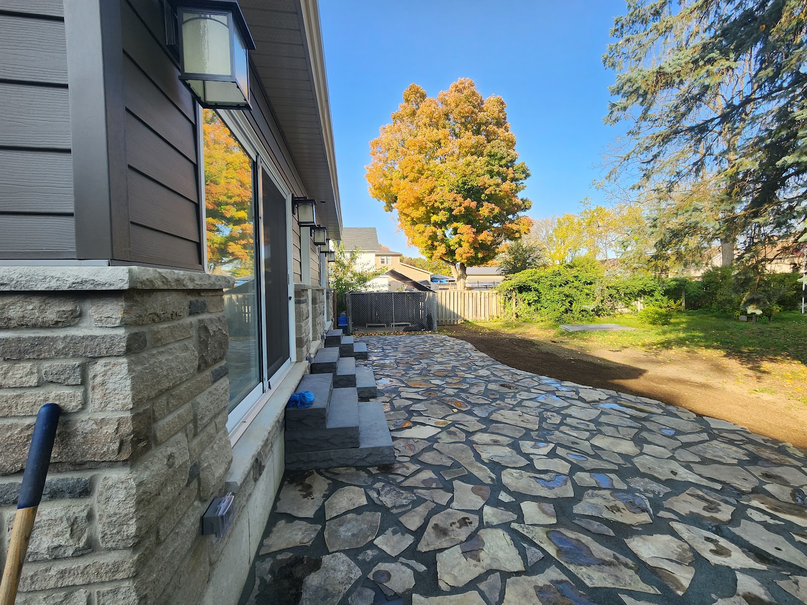 Backyard retaining wall and hardscape build in London, Ontario