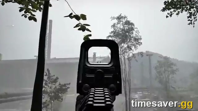 WARDOGS first-person rifle sight aimed across a hazy industrial landscape in Kolchia