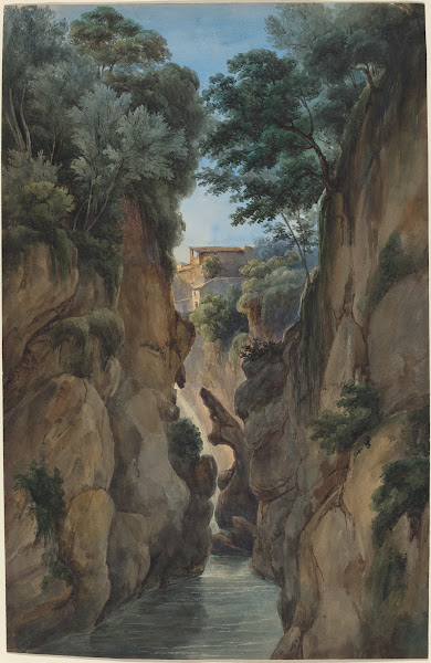View Of A Waterfall Through A Ravine