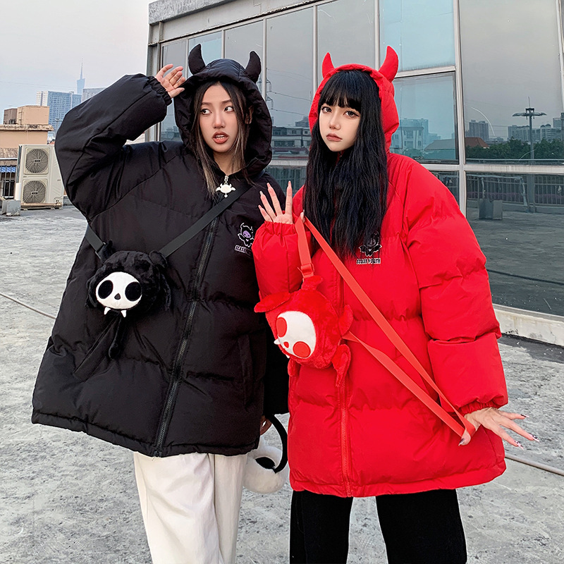 Oversized women's quilted jacket with hood and cartoon motif