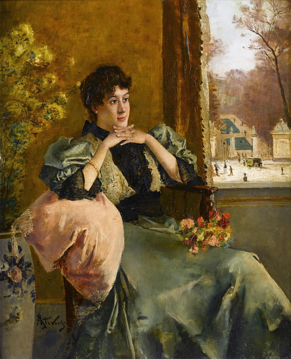 Femme pensive près dune fenêtre