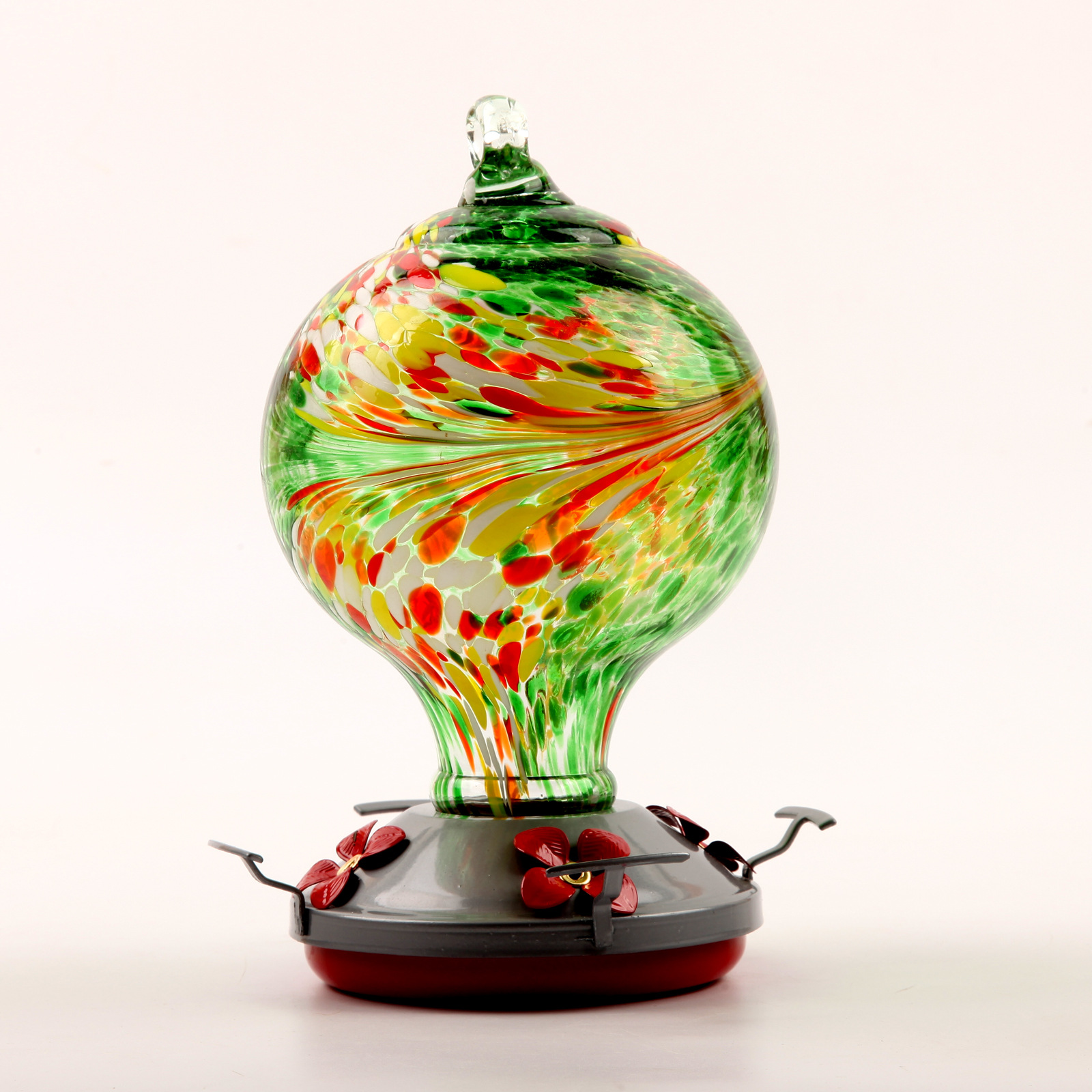 Decorative glass bird feeder for the garden