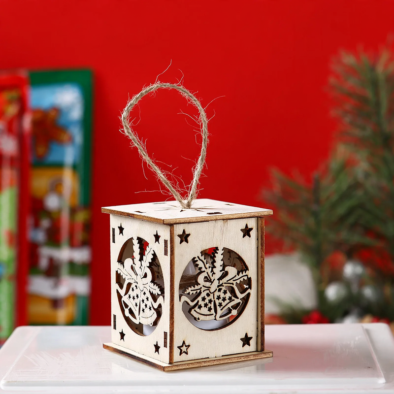 Illuminated wooden house for Christmas decoration