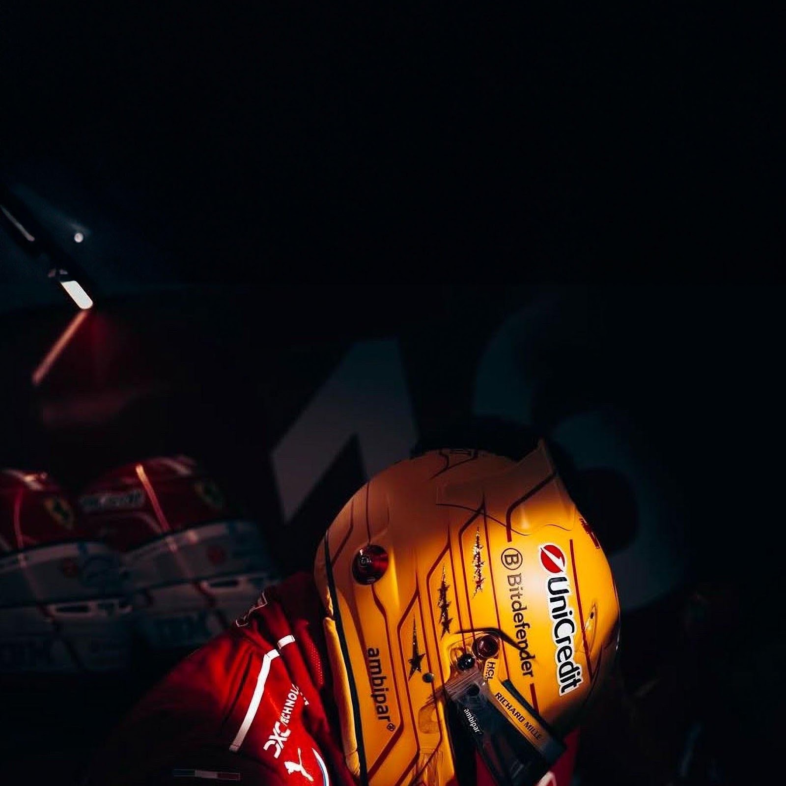 Download Ferrari Racer Helmet Under Spotlight 2K iPhone