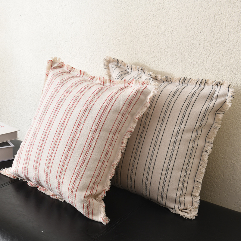 Square decorative cushion with stripe pattern