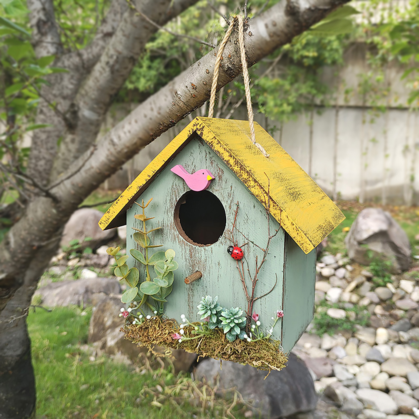 Birdhouse made of pine wood for wall mounting